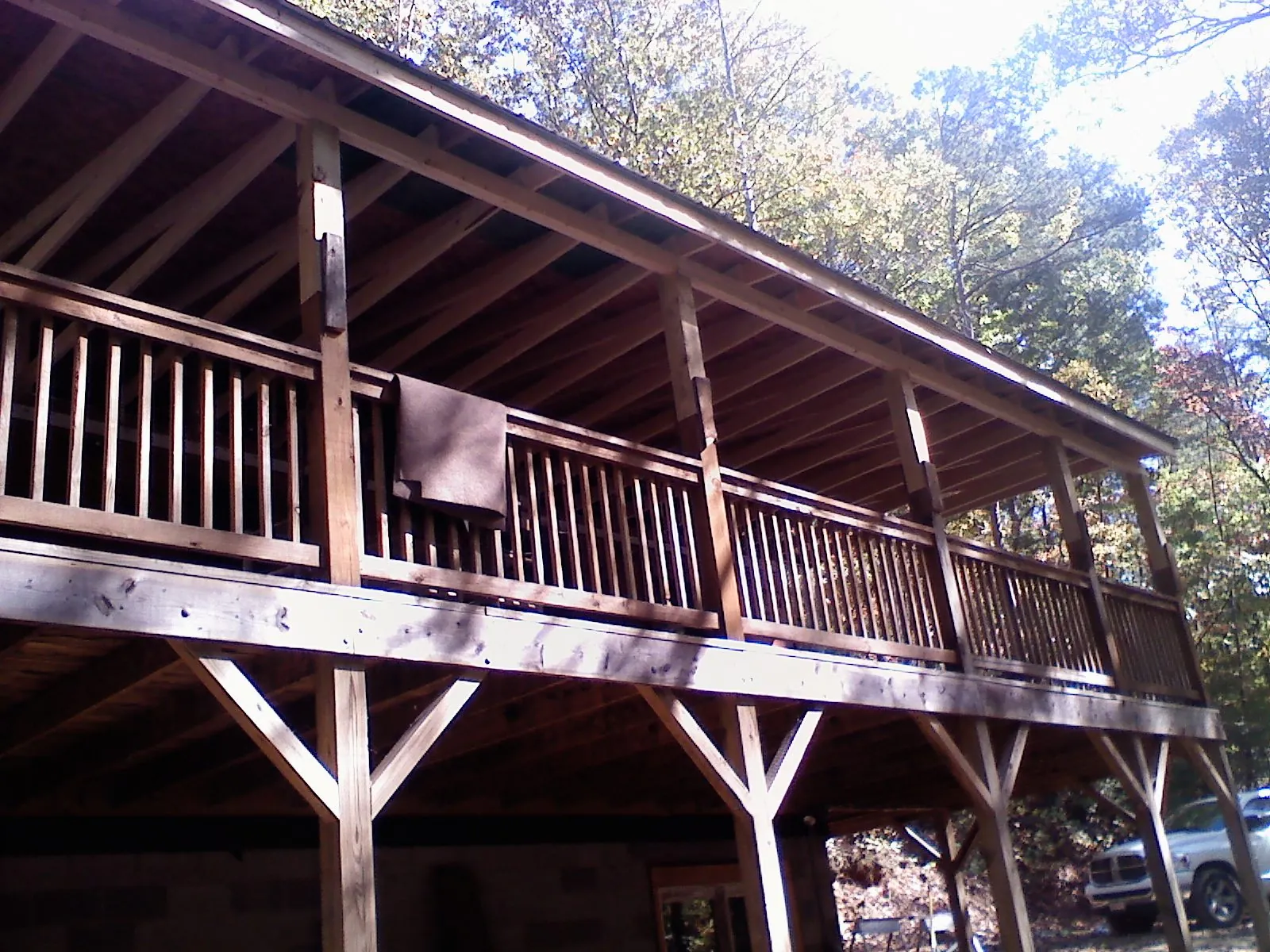 Timber framing under a new elevated porch and deck — Roof Leak Repair in Forest Falls by Roofing Brothers